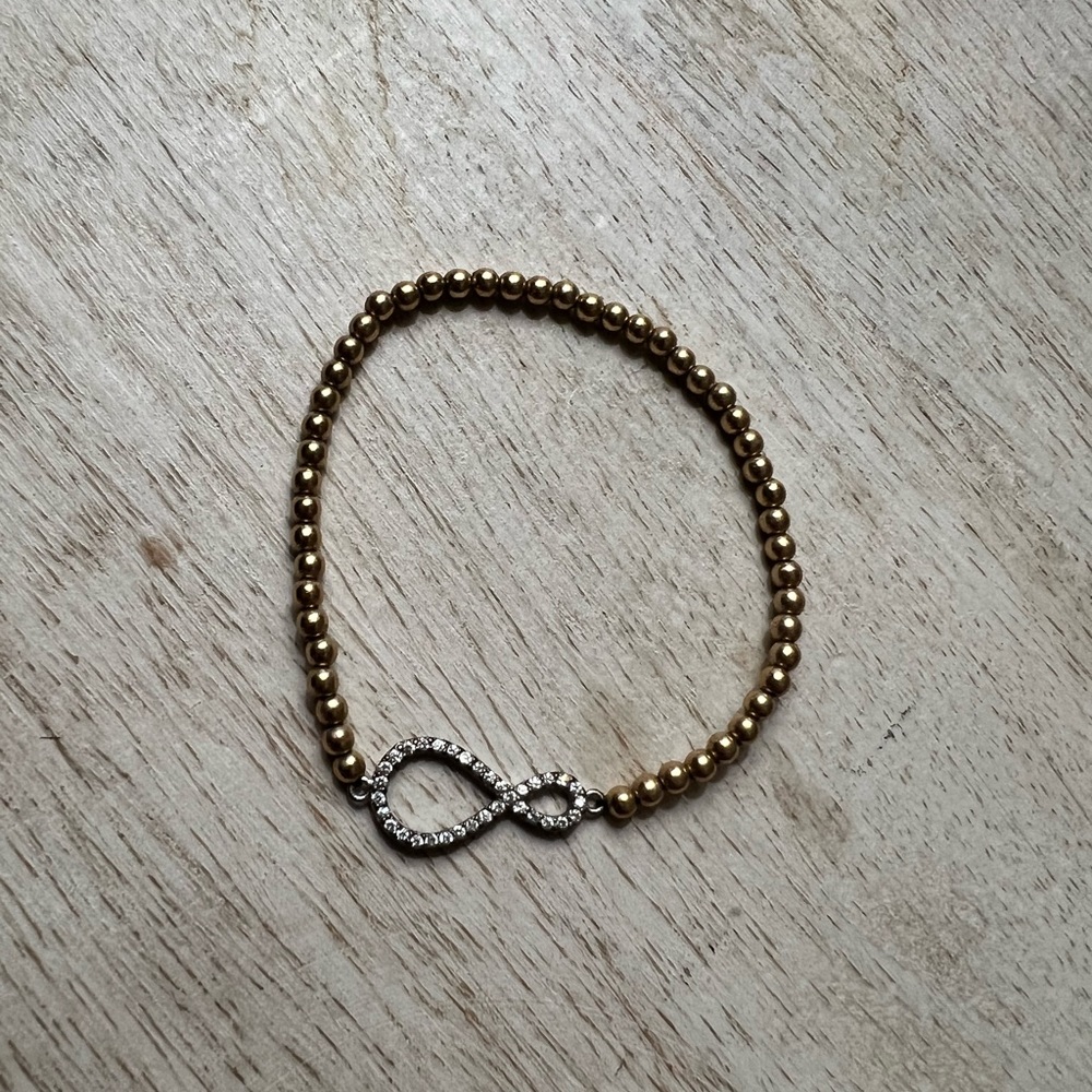 Infinity charm beaded bracelet